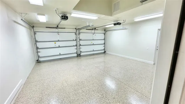 a black and white photo of a living room