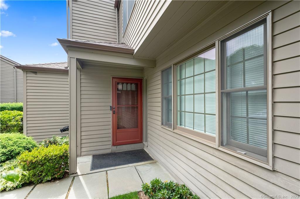 a view of a house with a large window