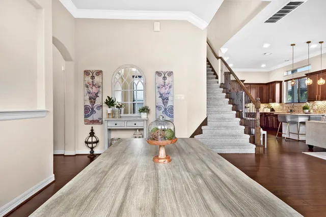 a view of a living room and dining room