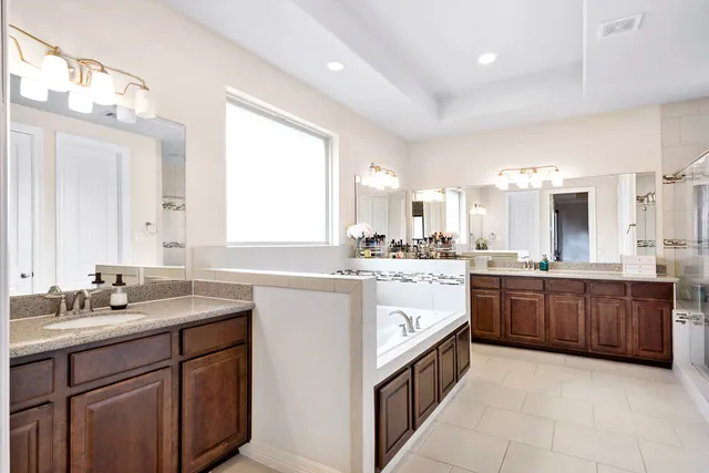 a large kitchen with a large window