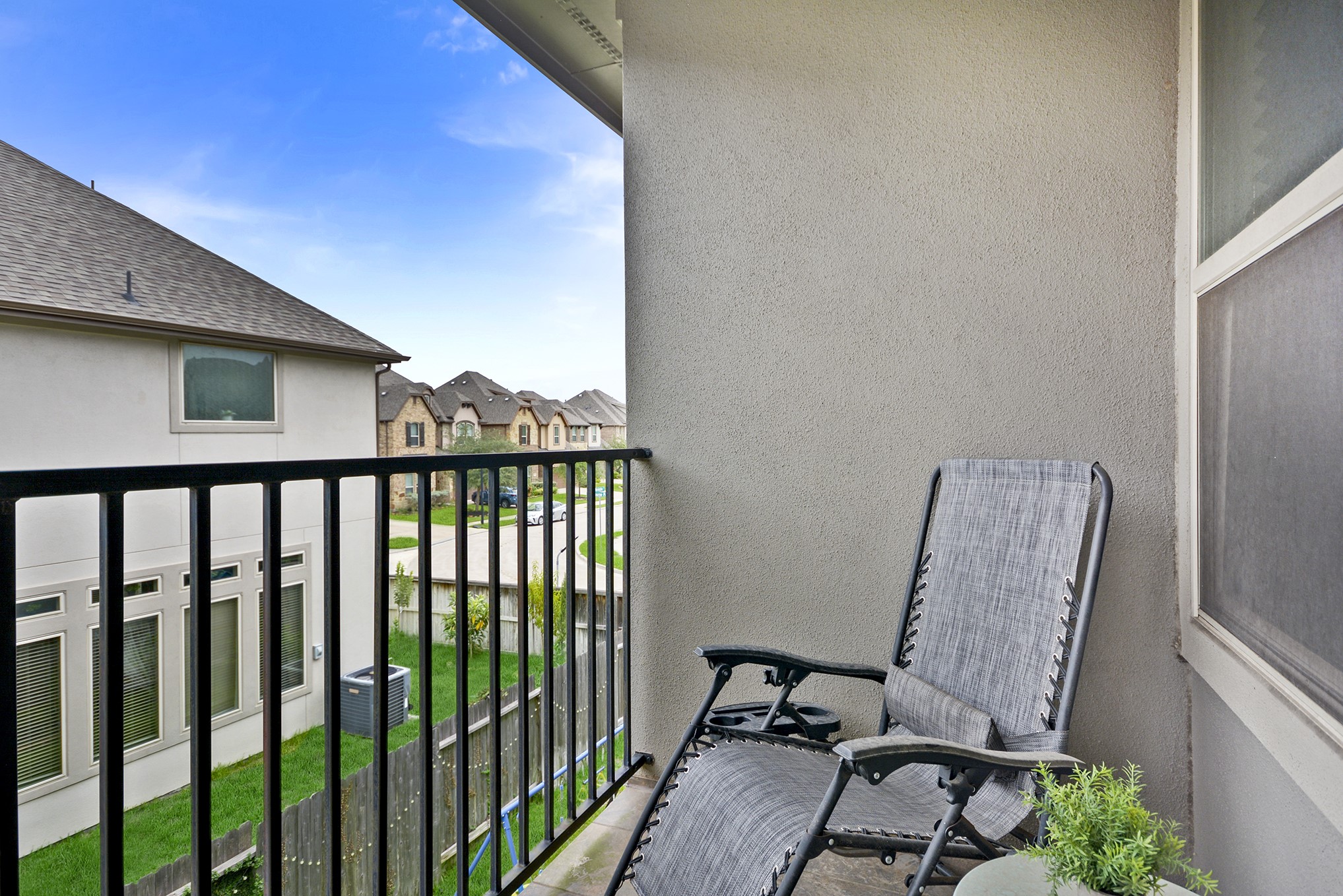 13204 Leighton Gardens Drive Houston, TX 77077 - Photo 20 of 35 a view of a chair and table in the balcony