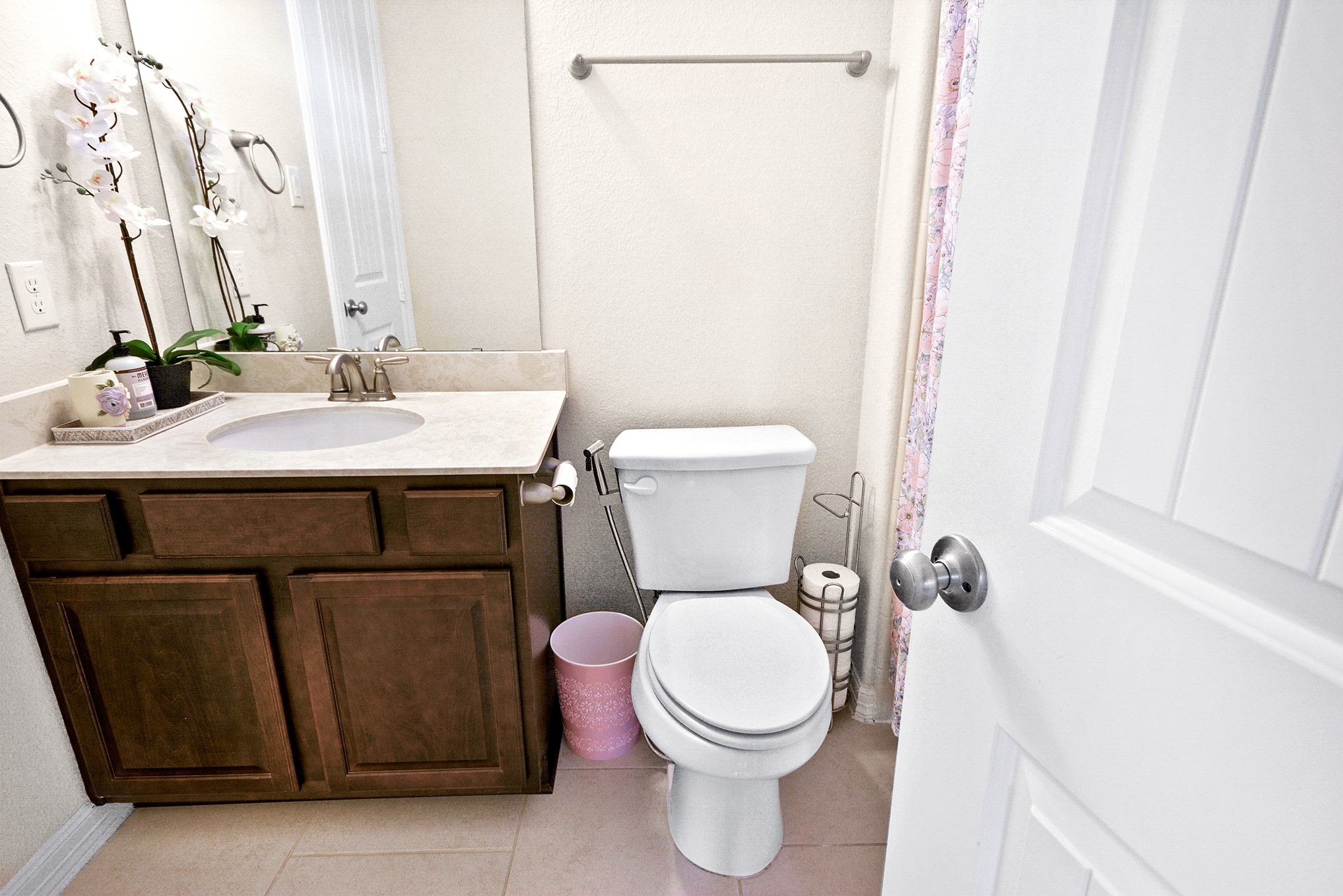 13204 Leighton Gardens Drive Houston, TX 77077 - Photo 24 of 35 a bathroom with a granite countertop sink toilet and a mirror