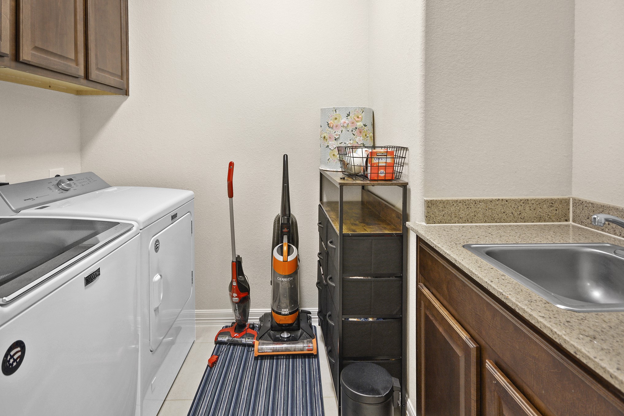 13204 Leighton Gardens Drive Houston, TX 77077 - Photo 26 of 35 a utility room with dryer and washer