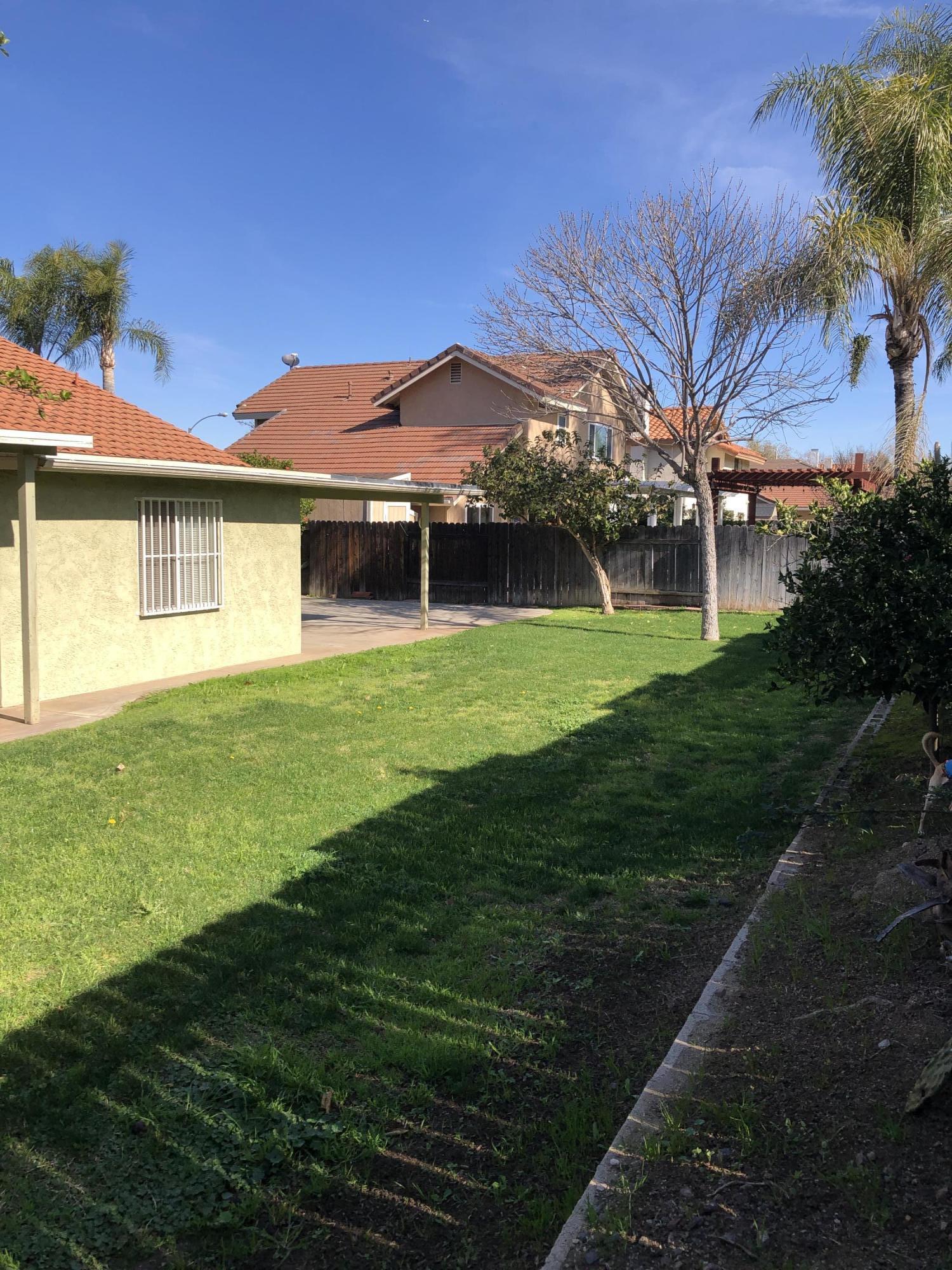 11368 Rancho Del Oro Drive Riverside, CA 92505 - Photo 18 of 20 a view of a house with a yard