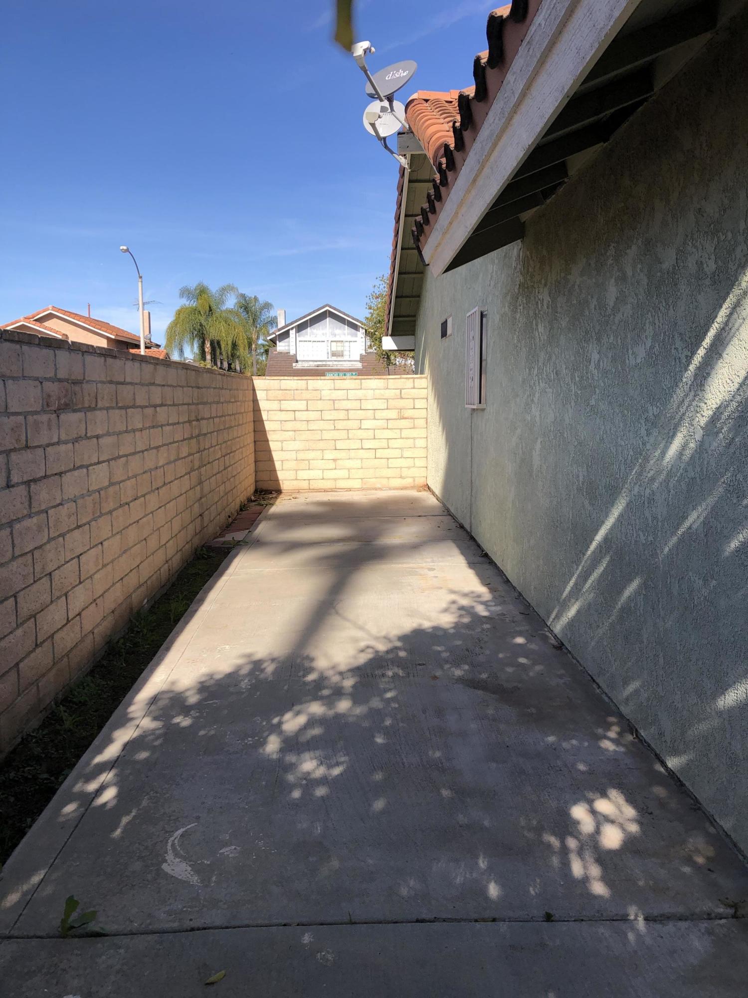 11368 Rancho Del Oro Drive Riverside, CA 92505 - Photo 19 of 20 a view of a pathway of a building