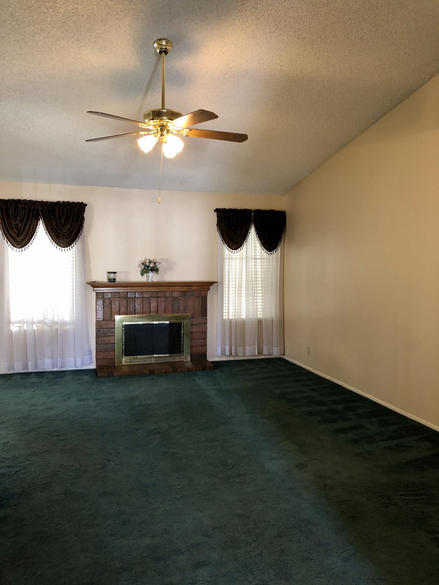 11368 Rancho Del Oro Drive Riverside, CA 92505 - Photo 3 of 20 a view of a fireplace in a room