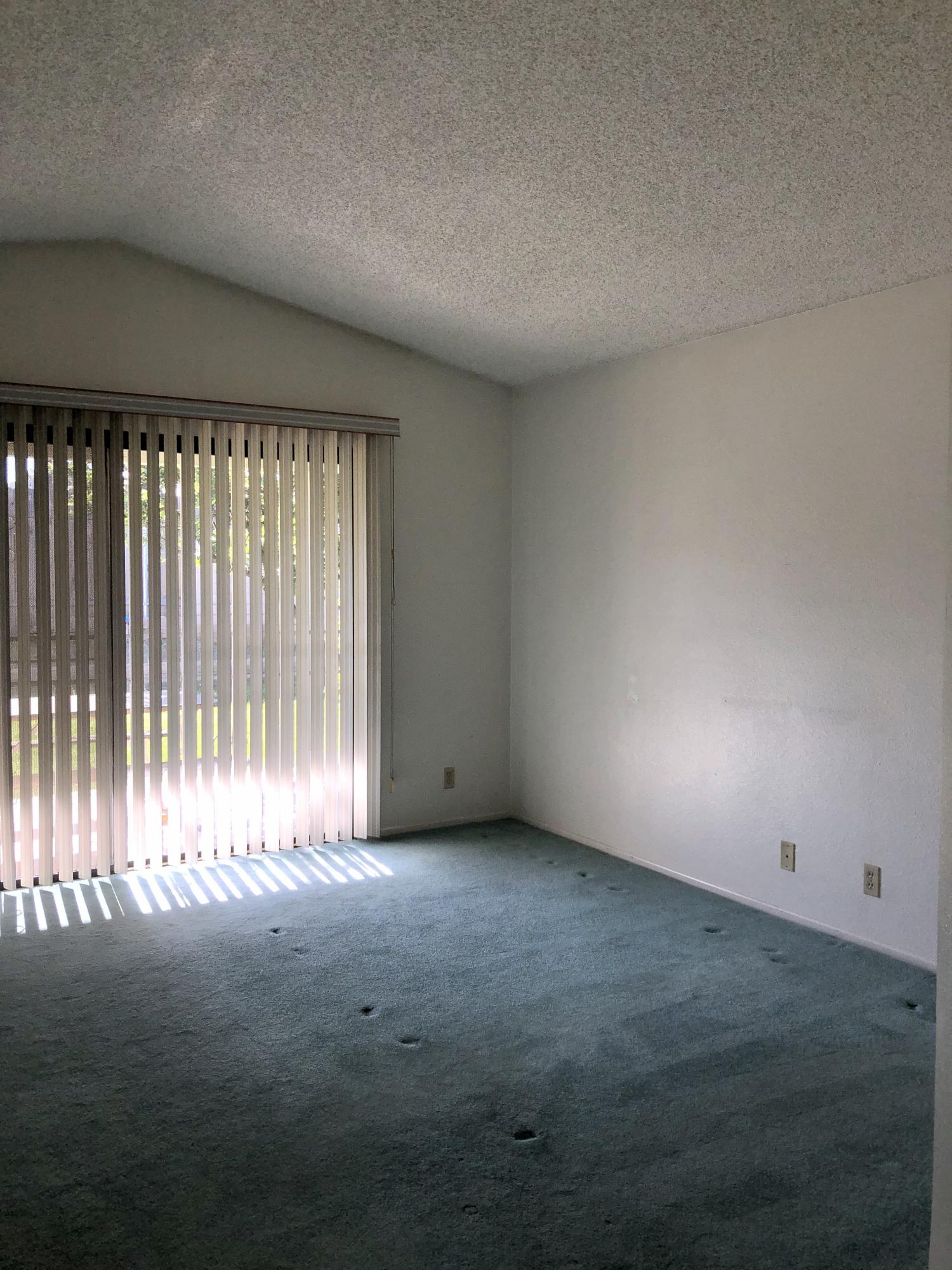 11368 Rancho Del Oro Drive Riverside, CA 92505 - Photo 9 of 20 a view of an empty room with a window