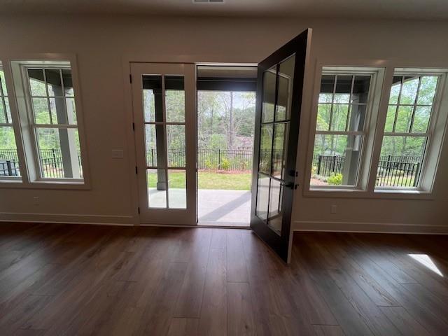 3932 Calm Court Chamblee, GA 30341 - Photo 12 of 27 a view of empty room with wooden floor and fan