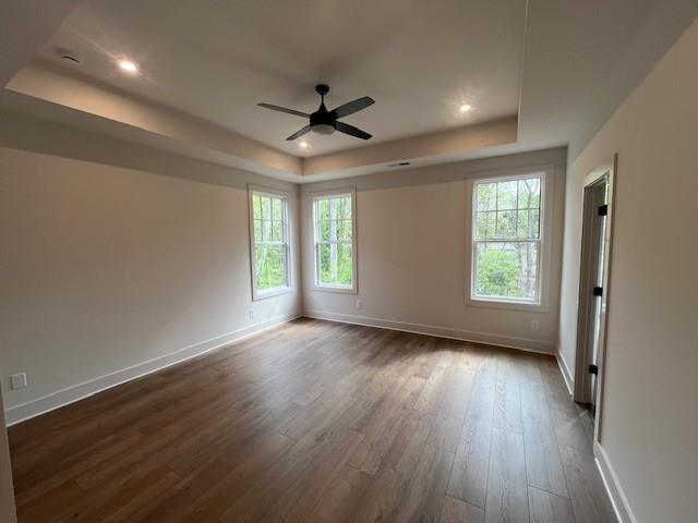 3932 Calm Court Chamblee, GA 30341 - Photo 15 of 27 a view of an empty room with wooden floor and a window