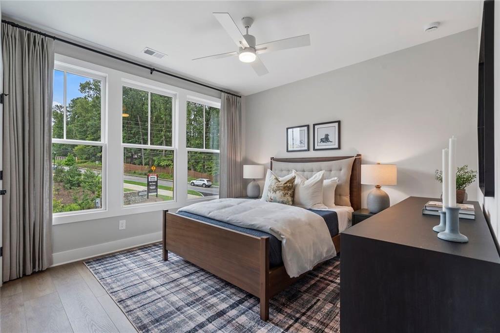 3932 Calm Court Chamblee, GA 30341 - Photo 27 of 27 a bedroom with a large bed and a window