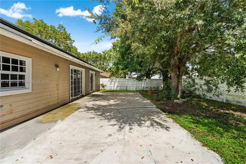a view of backyard with green space