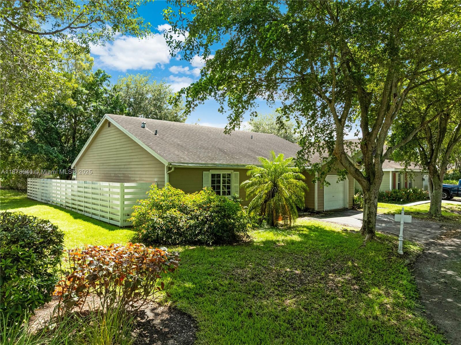 15025 Southwest 141st Court Miami, FL 33186 - Photo 26 of 29 a view of a house with a yard and sitting area