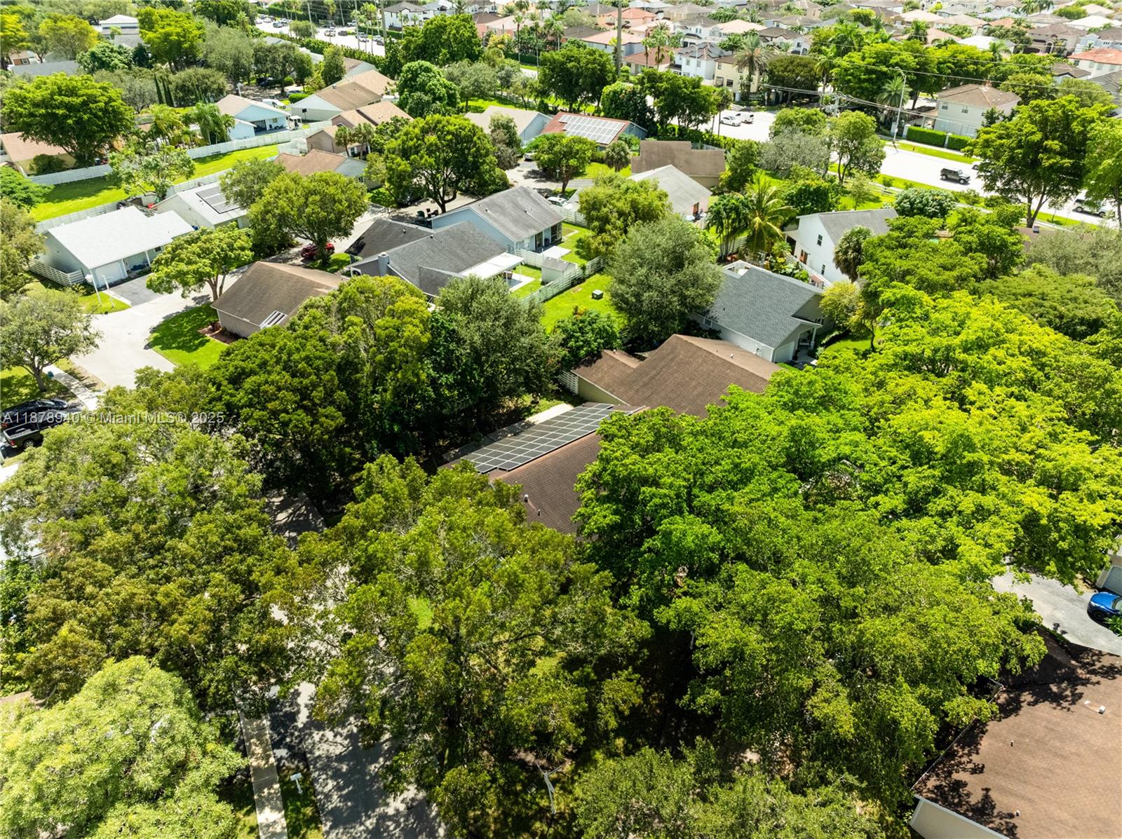15025 Southwest 141st Court Miami, FL 33186 - Photo 28 of 29 an aerial view of residential house with outdoor space and trees all around