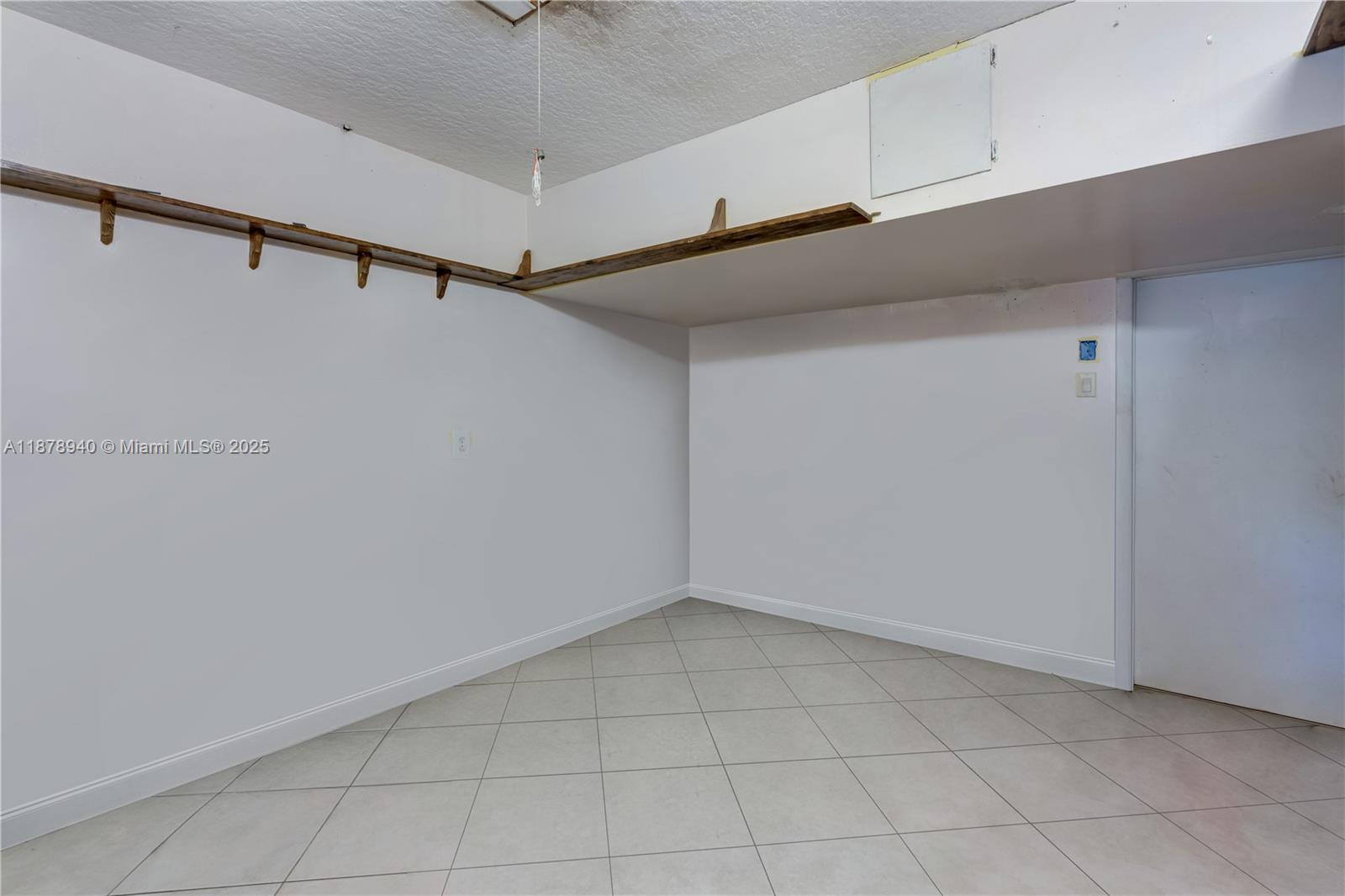 15025 Southwest 141st Court Miami, FL 33186 - Photo 6 of 29 a view of an empty walk in closet