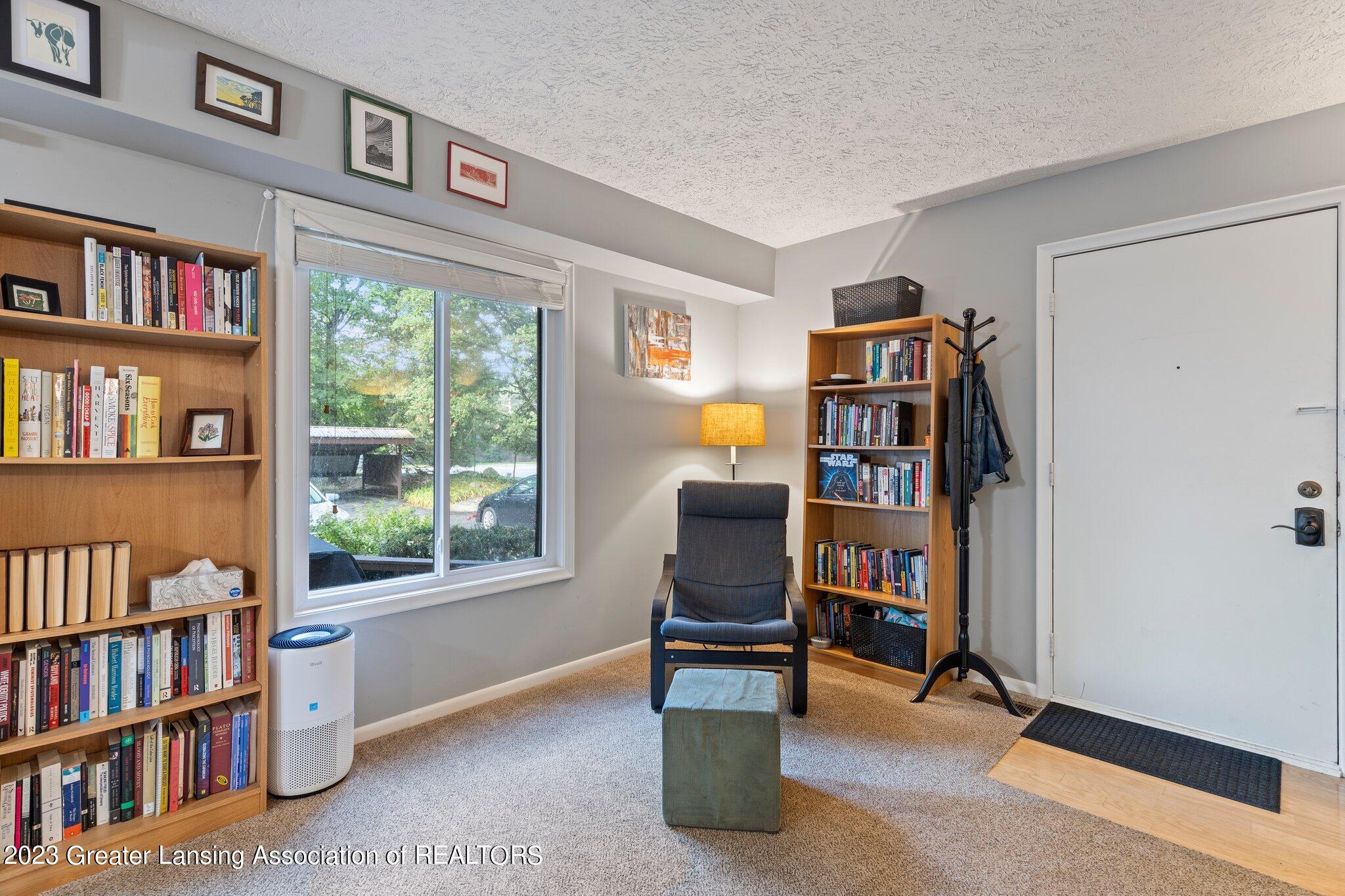 205 East Jolly Road, Unit 2 Lansing, MI 48910 - Photo 5 of 21 Reading nook in LR