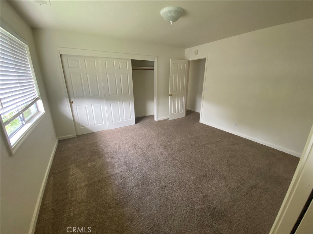 19790 Oak Flat Road Hidden Valley Lake, CA 95467 - Photo 11 of 23 a view of an empty room with a window