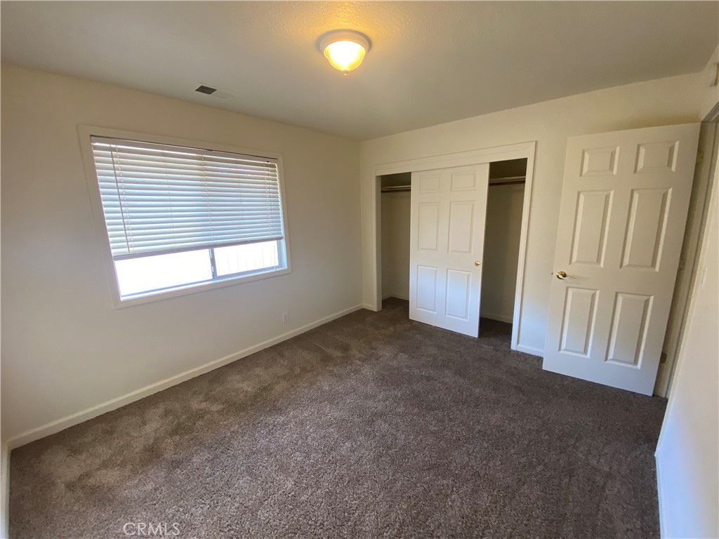 19790 Oak Flat Road Hidden Valley Lake, CA 95467 - Photo 18 of 23 a view of an empty room with a window
