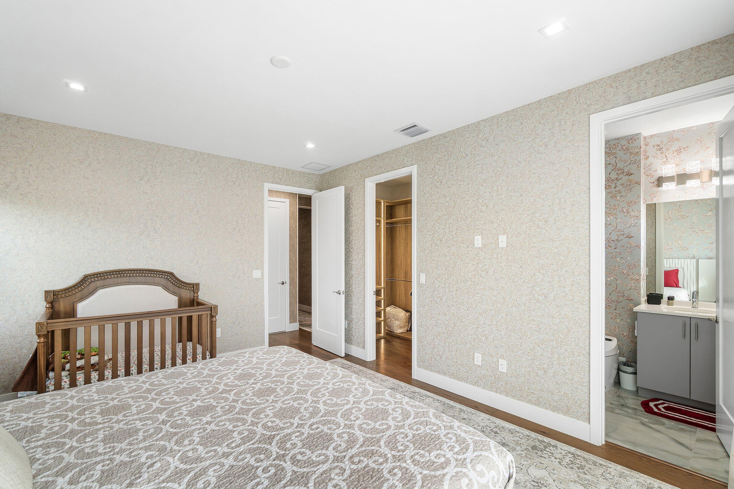 8233 Crystal Downs Avenue Boca Raton, FL 33434 - Photo 46 of 58 a bedroom with a bed and a large window