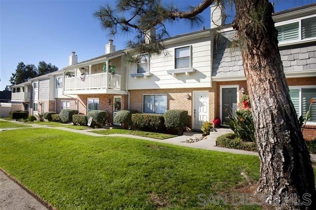 815 Del Mar Downs Road, Unit C Solana Beach, CA 92075 - Photo 1 of 19 a front view of a house with a yard and porch