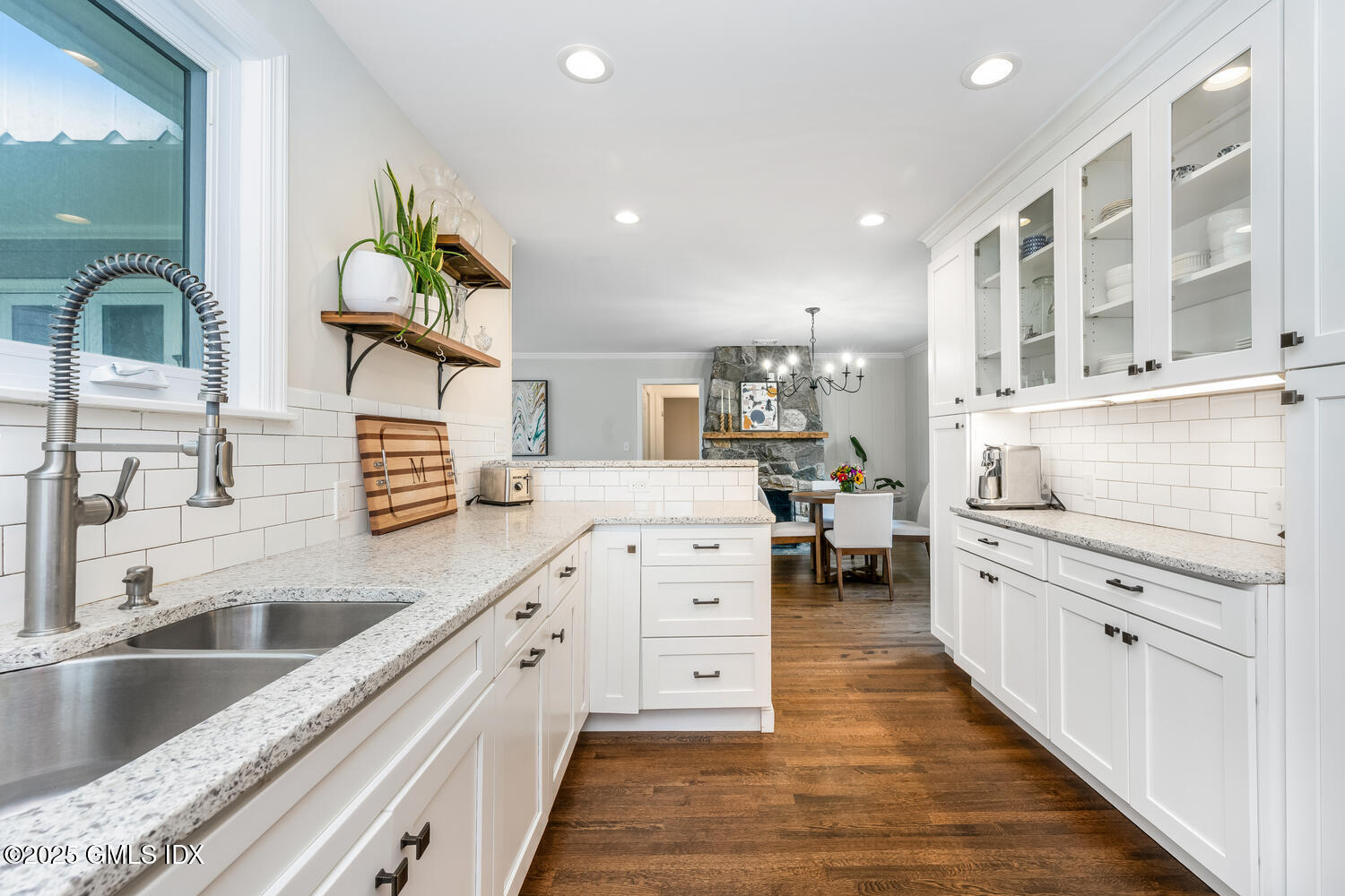 19 High Street Greenwich, CT 06830 - Photo 8 of 25 a kitchen with appliances cabinets and a sink