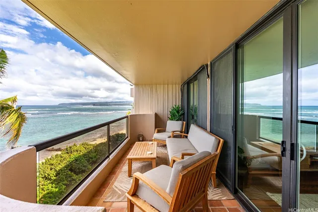 a bed room with furniture and a large window