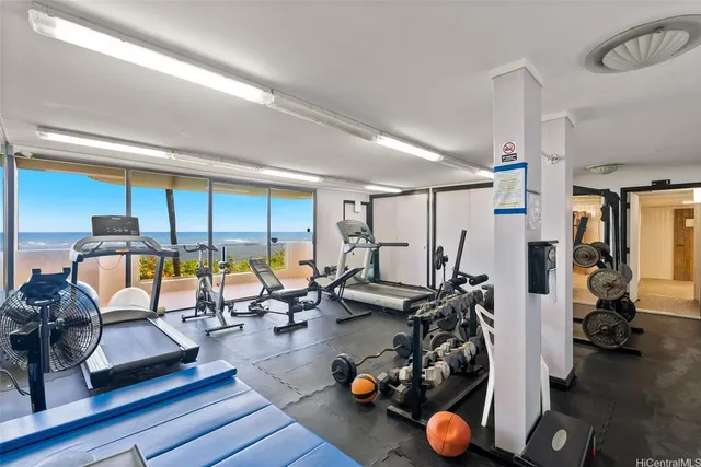 a view of a swimming pool with a lounge chair