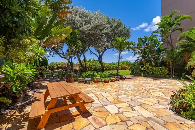 a view of a swimming pool with an outdoor space