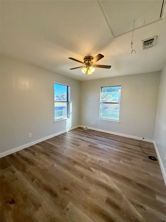 511 Central Avenue, Unit A Elgin, TX 78621 - Photo 7 of 10 a view of an empty room with a window