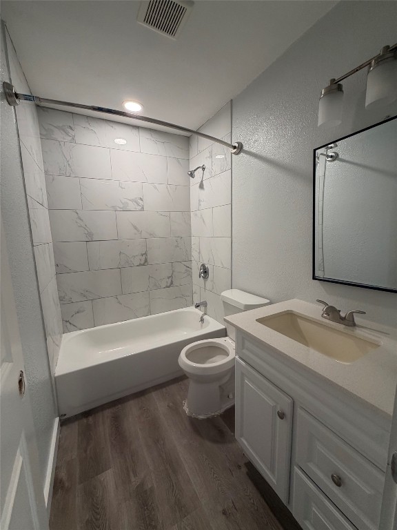 511 Central Avenue, Unit A Elgin, TX 78621 - Photo 10 of 10 a bathroom with a sink a toilet and shower