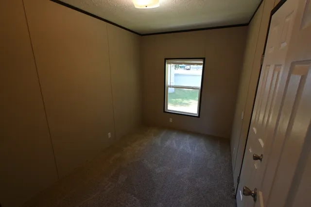 a view of a window in an empty room