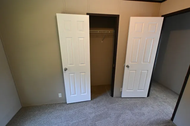 an empty room with closet