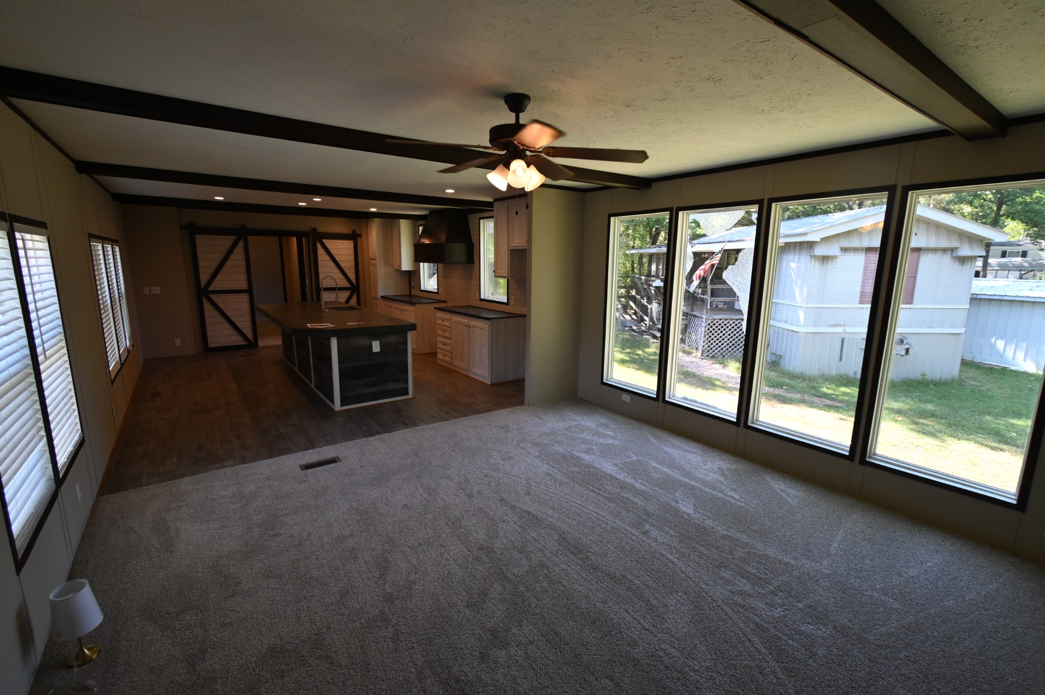 25 Marble Lane Linden, TN 37096 - Photo 14 of 49 a view of n empty room with window and chandelier fan