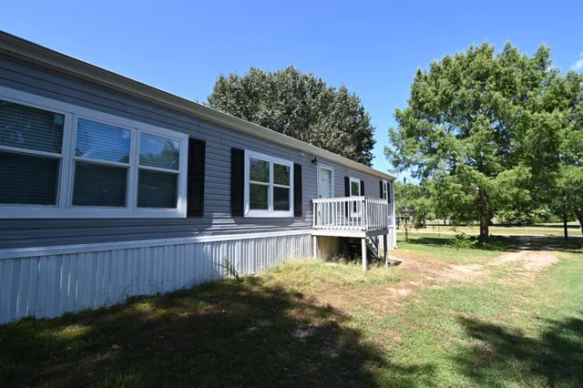a view of a house with a swimming pool