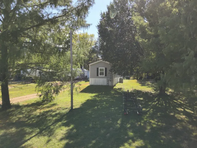 a view of a house with swimming pool