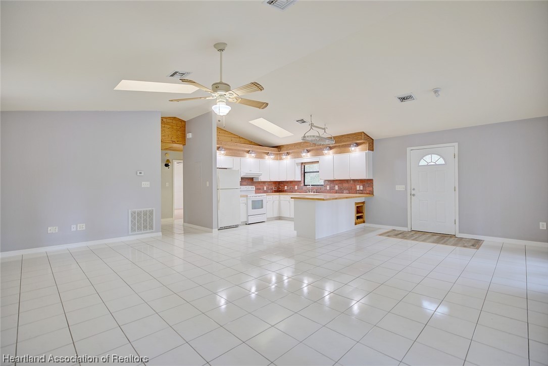 6304 Gunner Terrace Sebring, FL 33875 - Photo 20 of 41 a view of a kitchen with furniture and a kitchen
