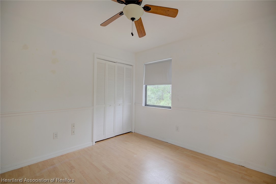 6304 Gunner Terrace Sebring, FL 33875 - Photo 29 of 41 an empty room with a window