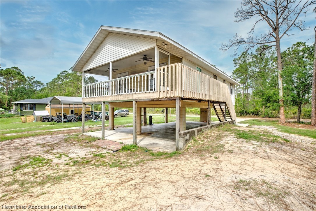 6304 Gunner Terrace Sebring, FL 33875 - Photo 35 of 41 a view of a house with a yard