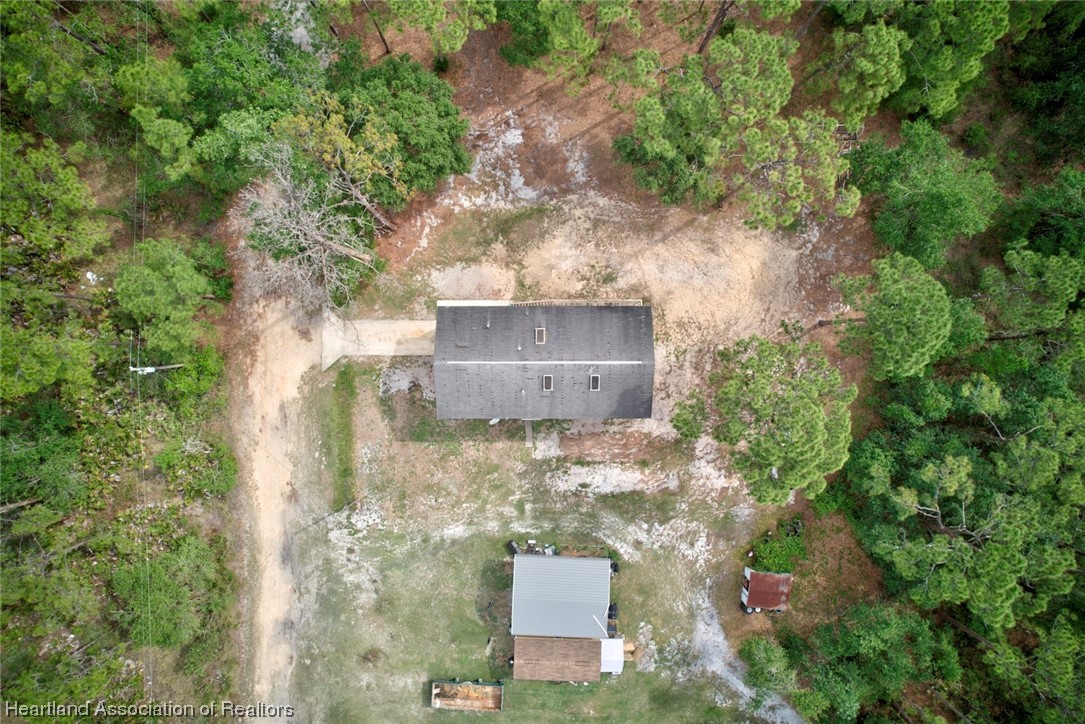 6304 Gunner Terrace Sebring, FL 33875 - Photo 38 of 41 an aerial view of a house with a yard