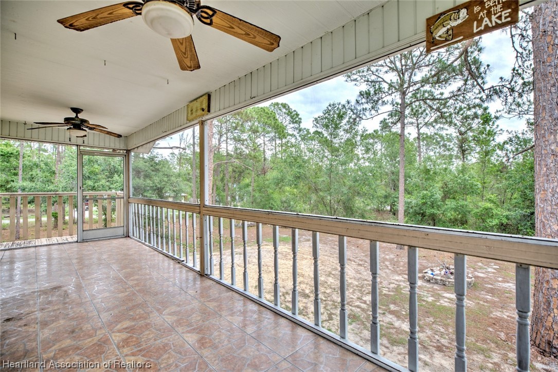 6304 Gunner Terrace Sebring, FL 33875 - Photo 5 of 41 a view of a porch