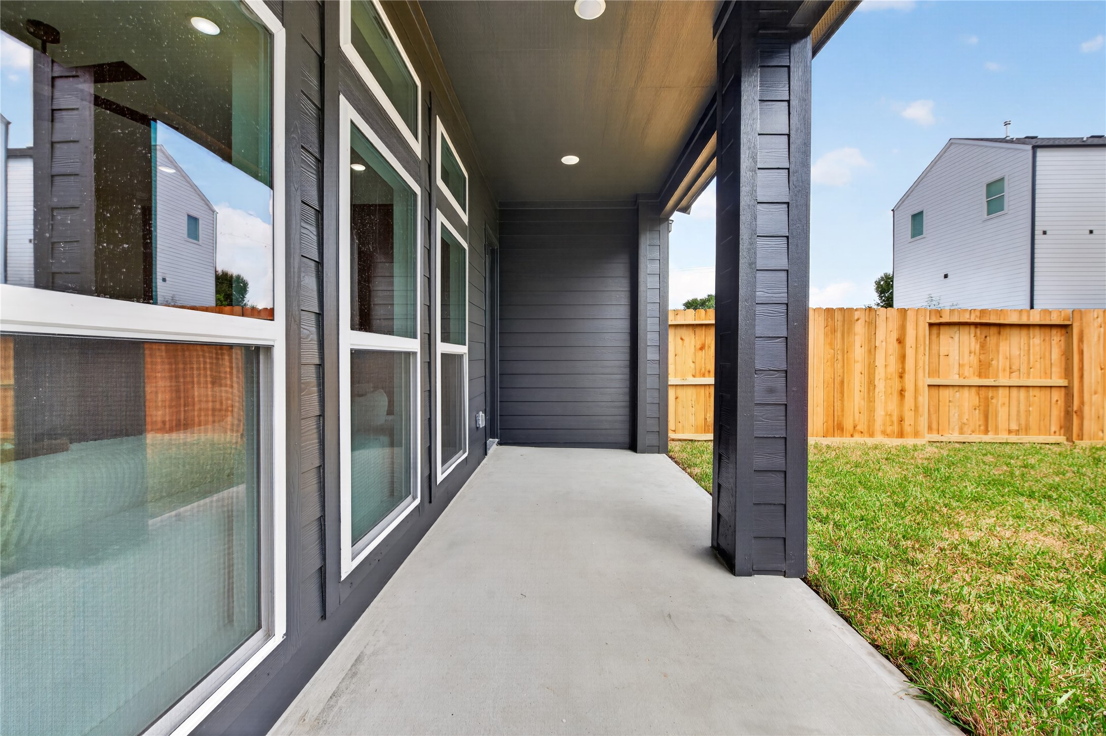 14101 Bridgeport Road Houston, TX 77047 - Photo 35 of 39 Covered patio lets you enjoy the back yard in any weather.