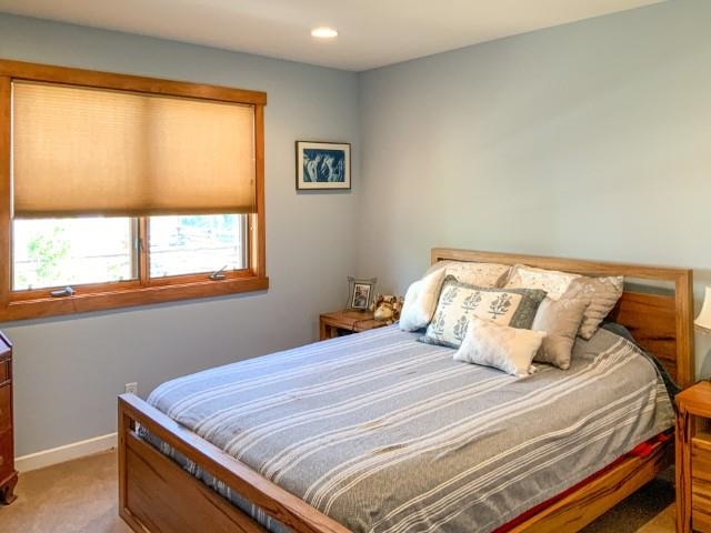 4958 Westridge Road Bishop, CA 93514 - Photo 18 of 24 a bedroom with a bed and window