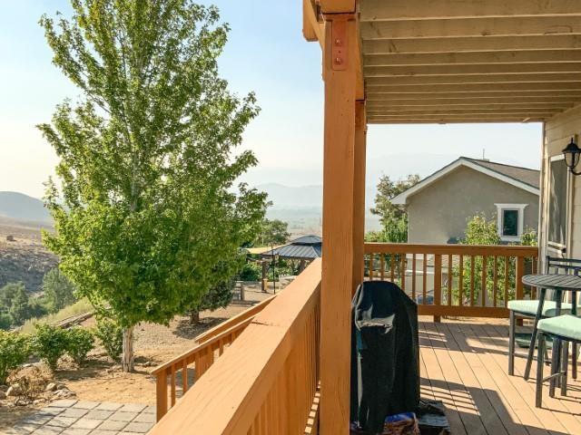 4958 Westridge Road Bishop, CA 93514 - Photo 24 of 24 a view of balcony with wooden floor and outdoor seating