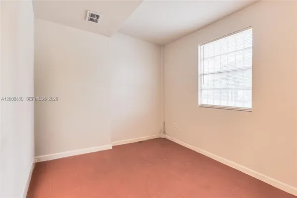 an empty room with a window