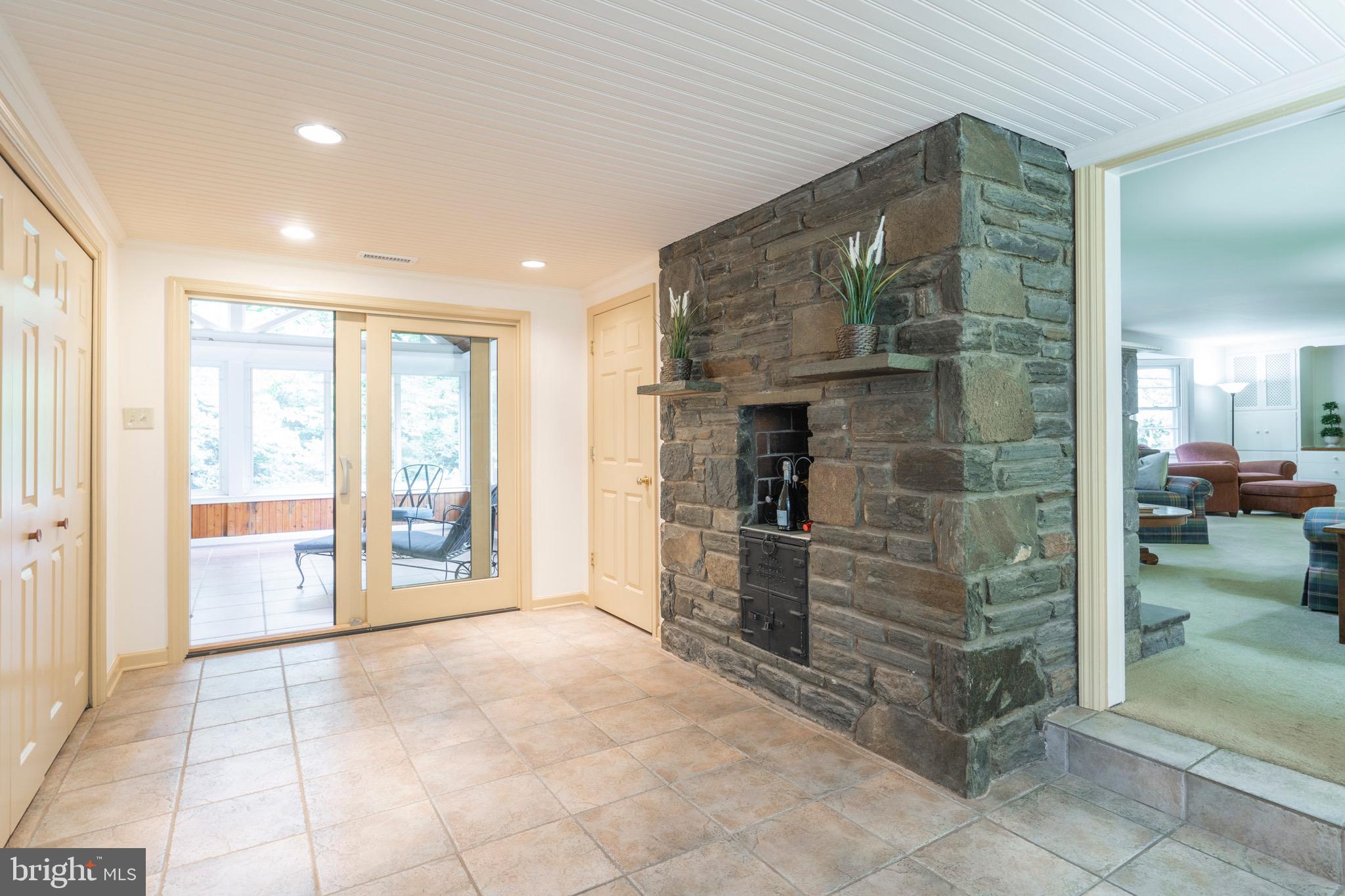651 Knox Road Wayne, PA 19087 - Photo 13 of 59 Family room - entrance to Sunroom