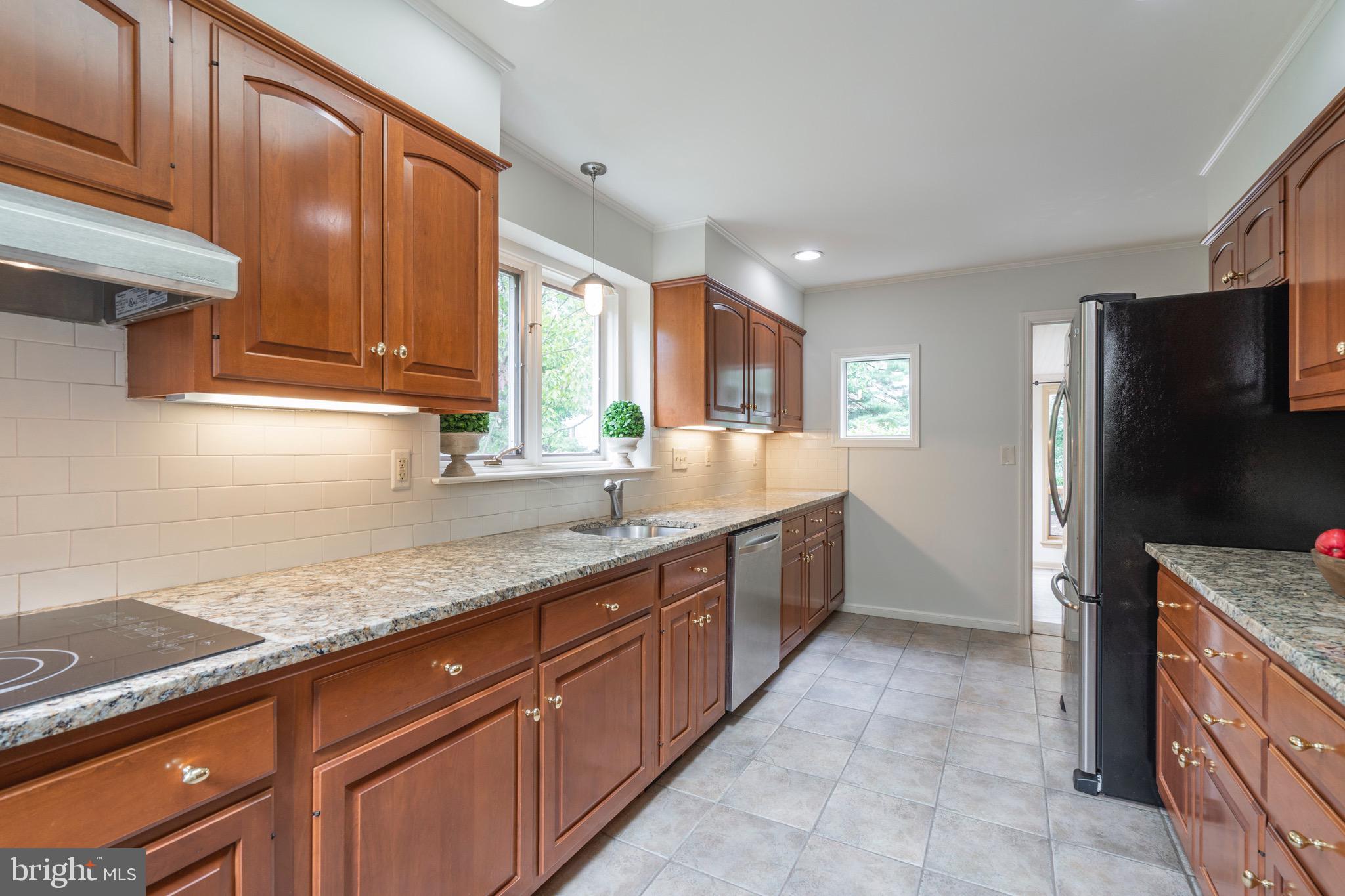651 Knox Road Wayne, PA 19087 - Photo 8 of 59 Galley kitchen - hardwood cabinets