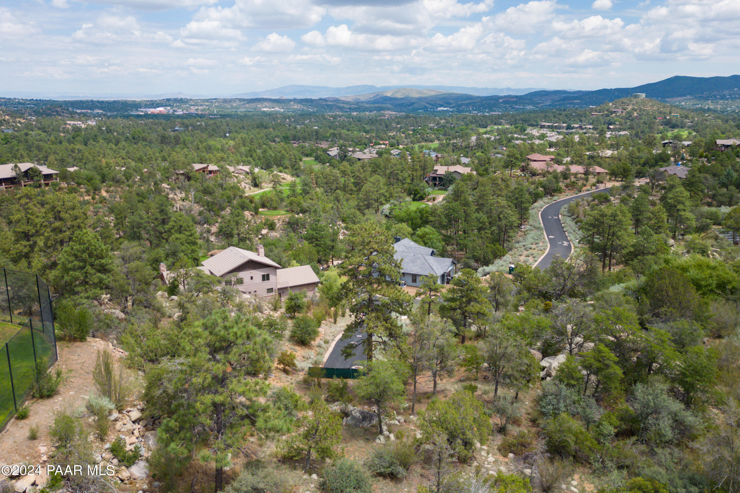 1900 Los Pinons Prescott, AZ 86303 - Photo 16 of 28 an aerial view of residential houses with outdoor space and trees