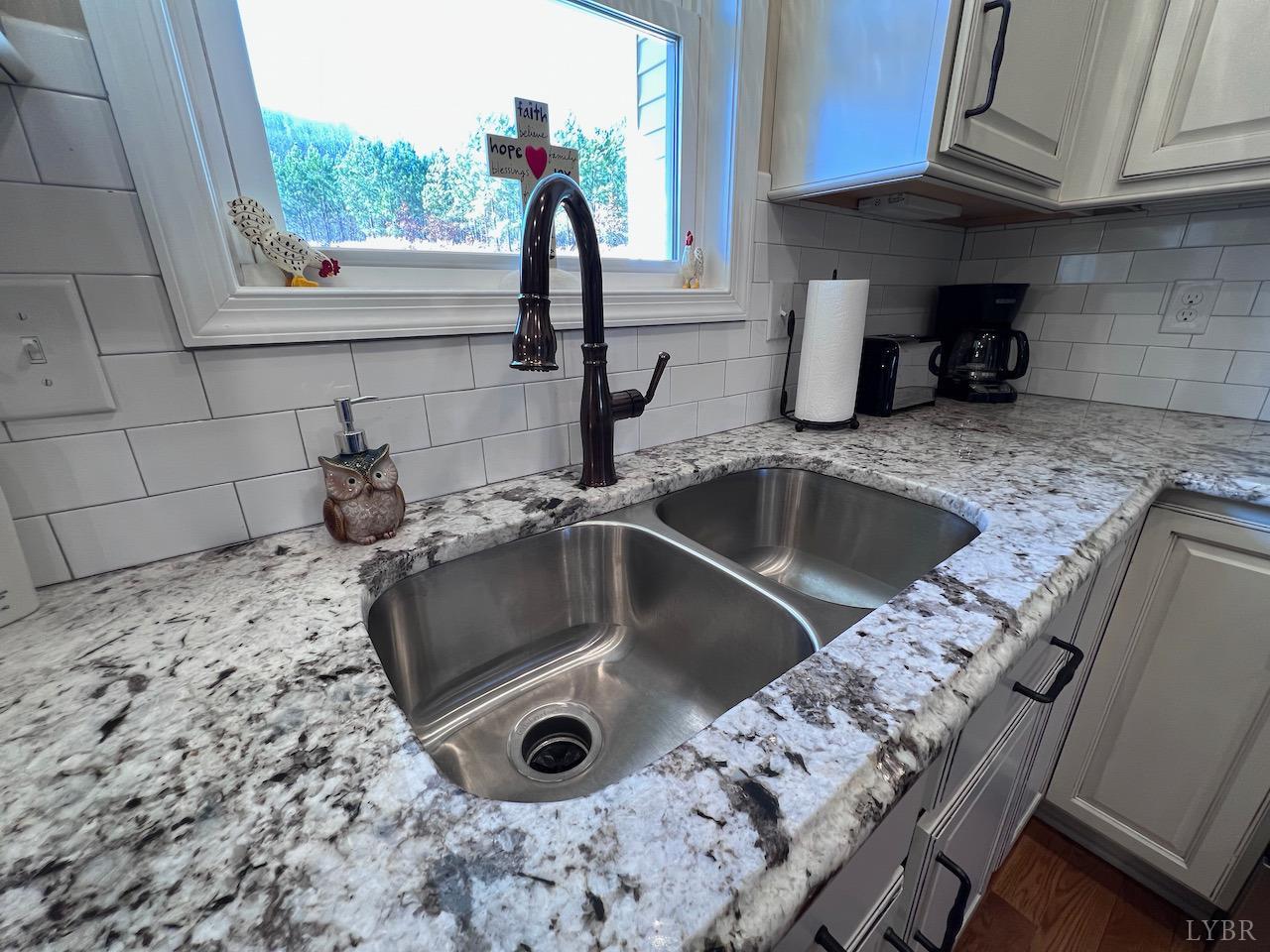 198 Oxford Furnace Road Lynchburg, VA 24504 - Photo 13 of 33 a kitchen with a sink and a stove