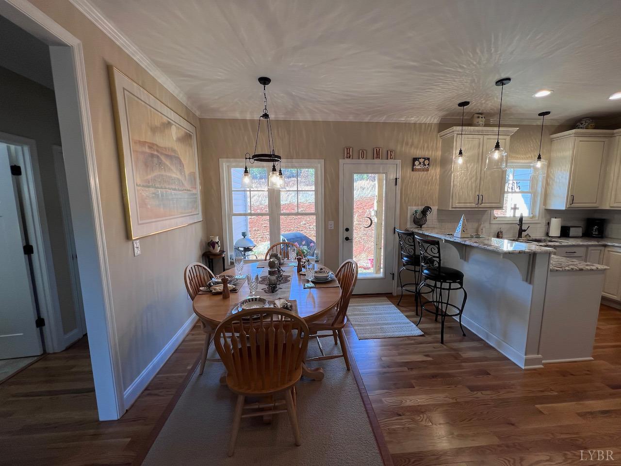198 Oxford Furnace Road Lynchburg, VA 24504 - Photo 16 of 33 a view of a dining room with furniture window and wooden floor
