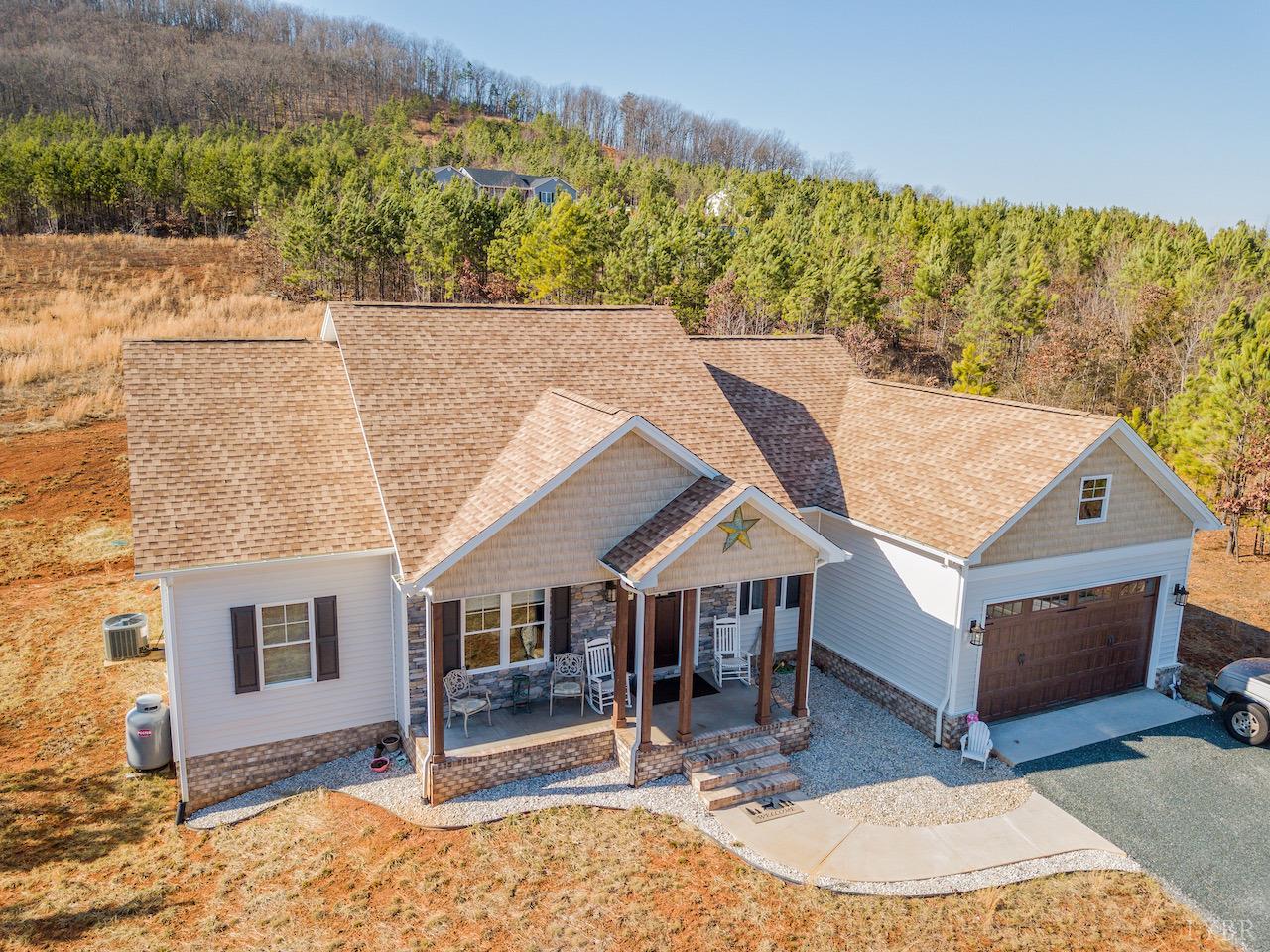 198 Oxford Furnace Road Lynchburg, VA 24504 - Photo 2 of 33 a aerial view of a house with a porch