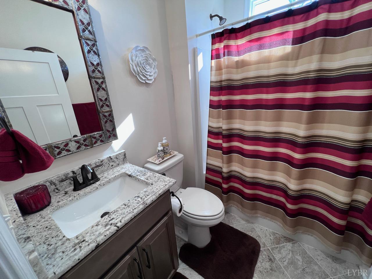 198 Oxford Furnace Road Lynchburg, VA 24504 - Photo 29 of 33 a bathroom with a sink and a mirror